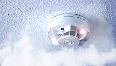 smoke detector in the ceiling for the Commercial Fire Systems blog post